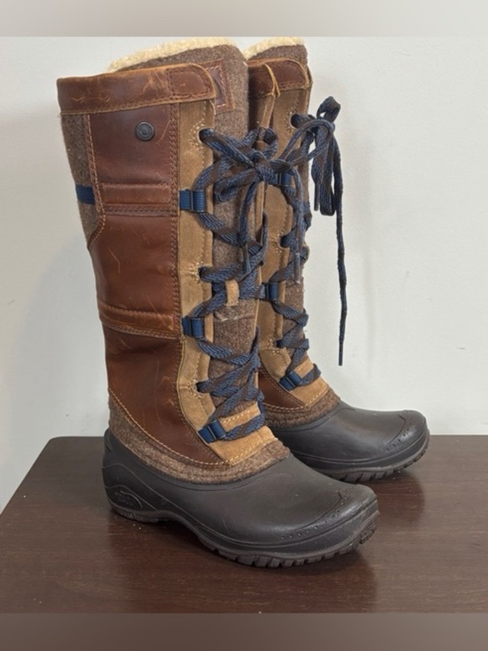 The North Face Women's Tall Brown Lace-Up Winter Boots with Navy Laces